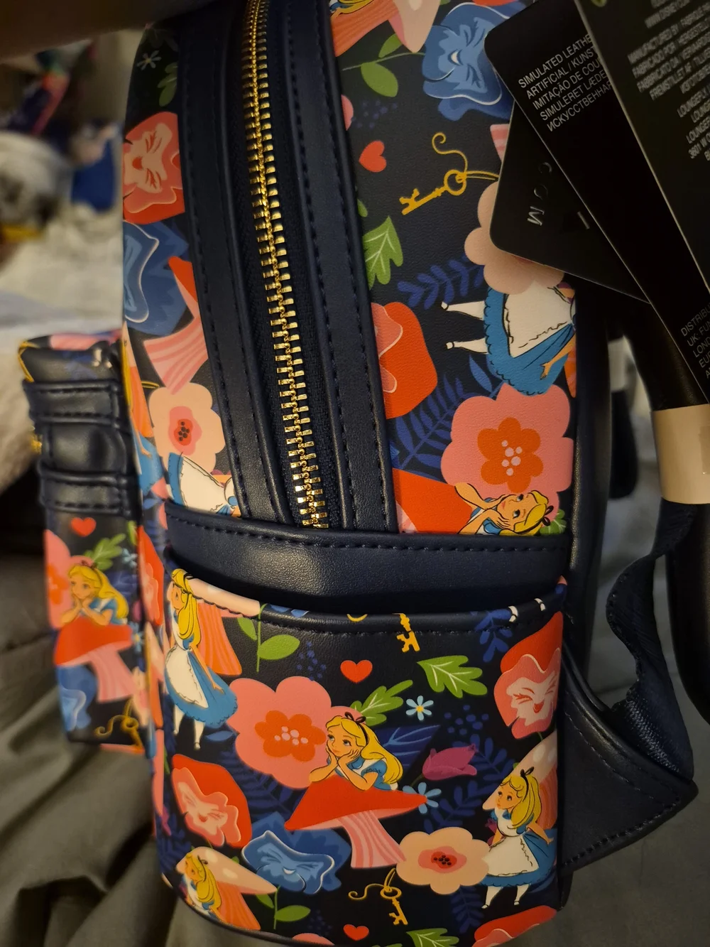 Loungefly Navy Alice in Wonderland Floral all over Print Mini Backpack
